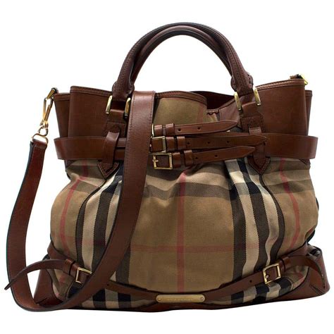 burberry striped canvas tote with leather trim|Burberry medium top handle tote.